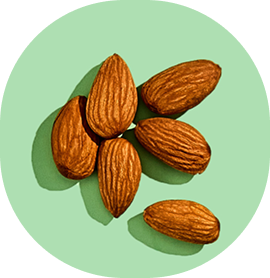 Six almonds on a light green background.
